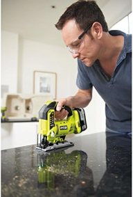 man using a Ryobi cordless jigsaw