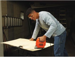 man using the Black and Decker jigsaw