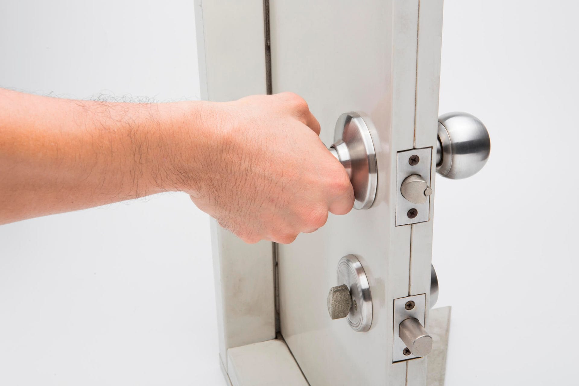 Close up of a person opening a aluminum door