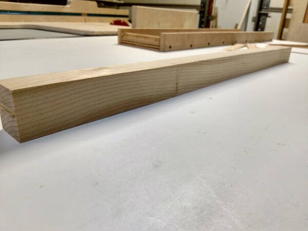 squared and planed rough cut board