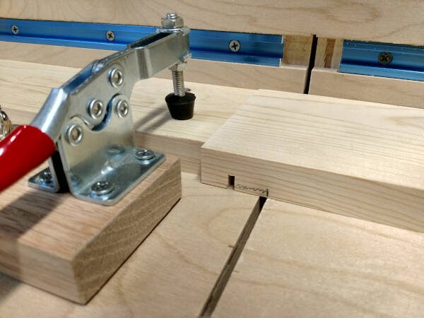 repeating the cut for the other side of the dovetail drawer dado